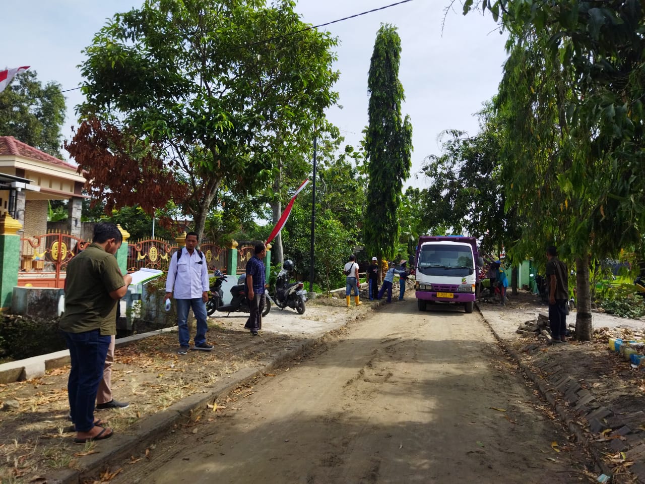 Monitoring dan Evaluasi BKK Desa Pembangunan Jalan Aspal Tahap 2